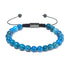 Edelsteinarmband aus blauem Apatit mit 8 mm Perlen auf weißem Hintergrund – UNIQAL Design mit Stil und Klarheit